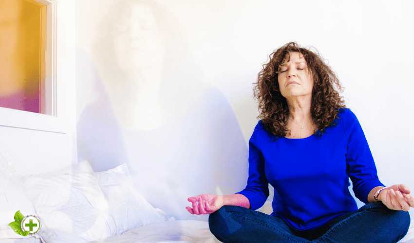 A woman meditating to experience astral projection 