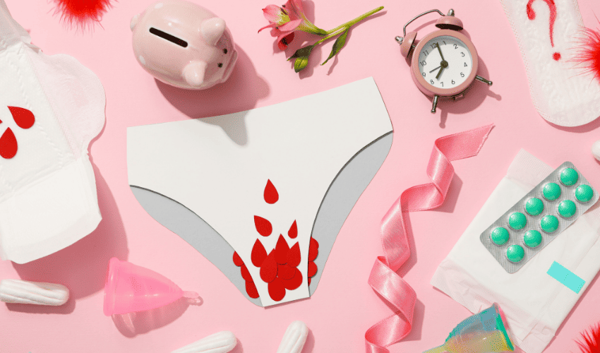 Pads and other menstruation tools with pink background 