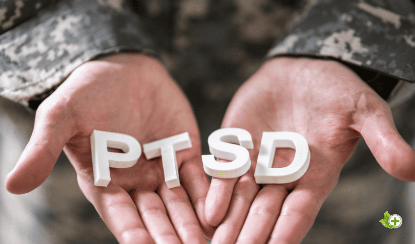 A solider holding letters for PTSD in his hands 