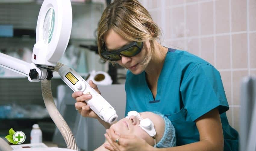 A woman receiving laser treatment in a post about Laser Skin Resurfacing Treatment